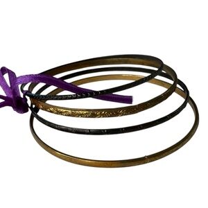 Set of Gold and Black Bangles